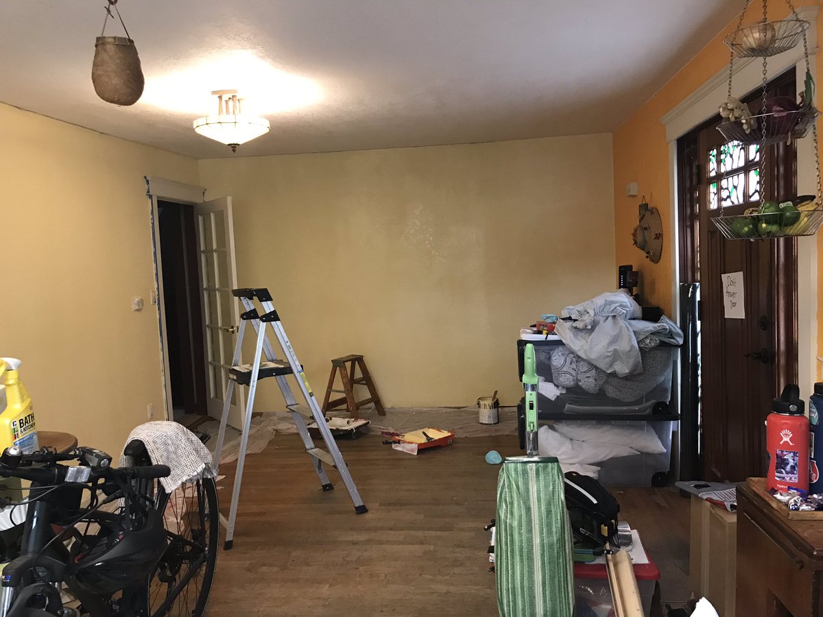 Butter yellow walls- Satan chose all the colors for this project (I had to convince her to let us do a grey accent wall)