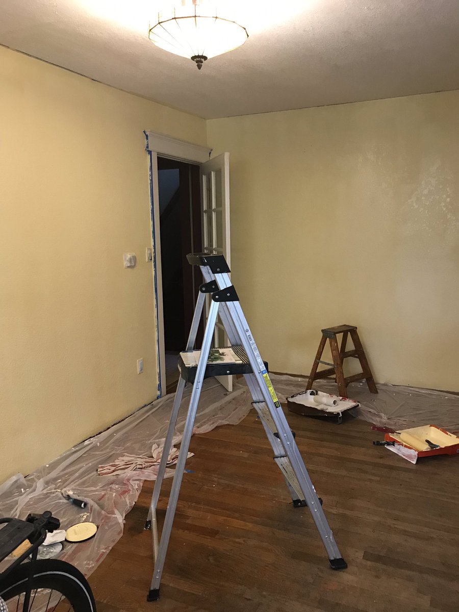 Butter yellow walls- Satan chose all the colors for this project (I had to convince her to let us do a grey accent wall)