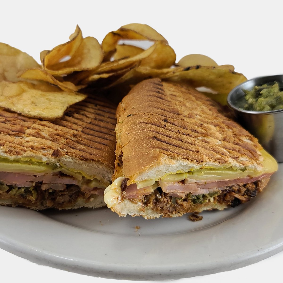 We just added a Cuban Sandwich to our online menu! Alyssa made some pan cubano to fill with pulled pork, sorghum ham, kenny's Swiss and gooseberry salsa verde. We even made some badass homemade kennebec chips for this!