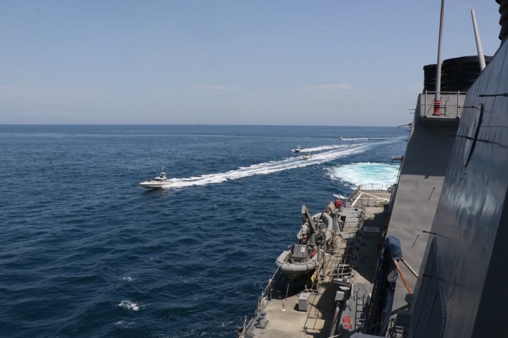 1. IRGCN boats conduct unsafe interaction with #USNavy ships by crossing the ships bows and sterns at close range in North Persian Gulf.
This is a picture of Arleigh Burke-class destroyer USS Paul Hamilton #DDG60 which has left USS Theodore Roosevelt #CVN71 CSG in Guam.