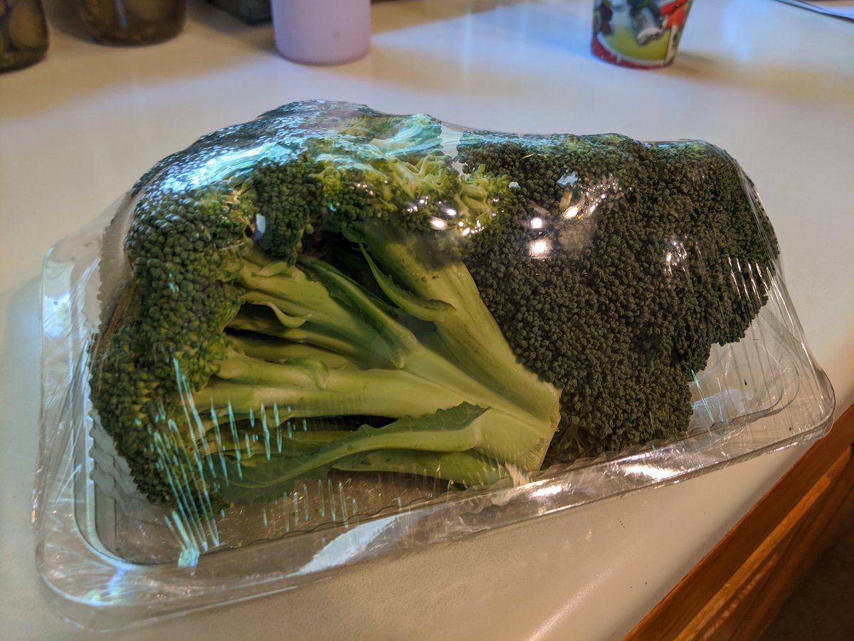 willklinger's tweet photo. @AldiUSA what's with the plastic tray and plastic wrap on the broccoli? This is new and seems wasteful. https://t.co/TOUfUj7Egg