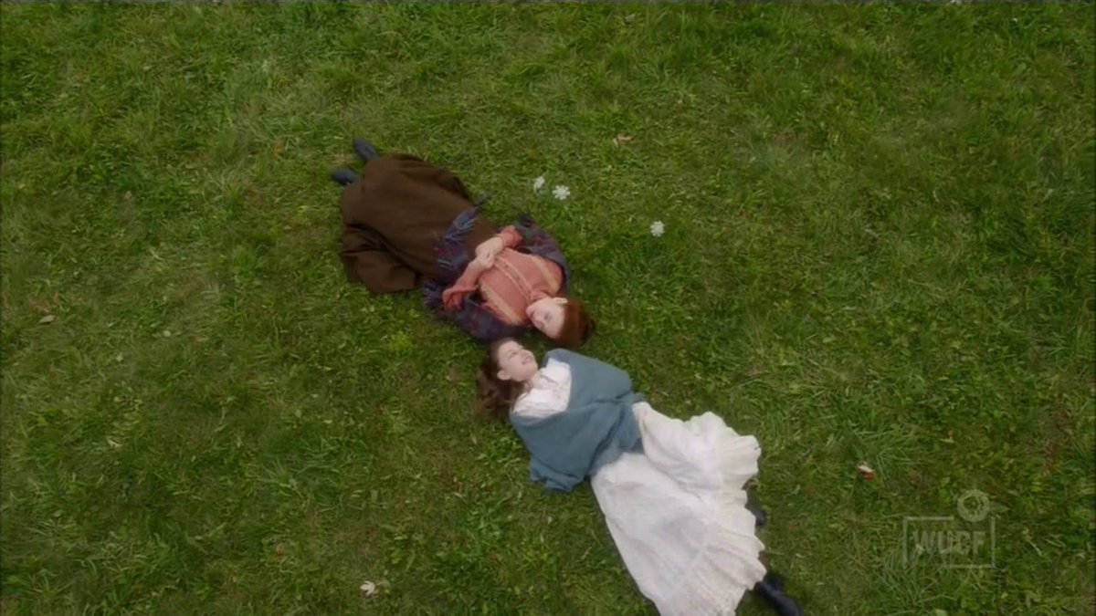 They are lying on the ground but their dresses are SUPER clean.