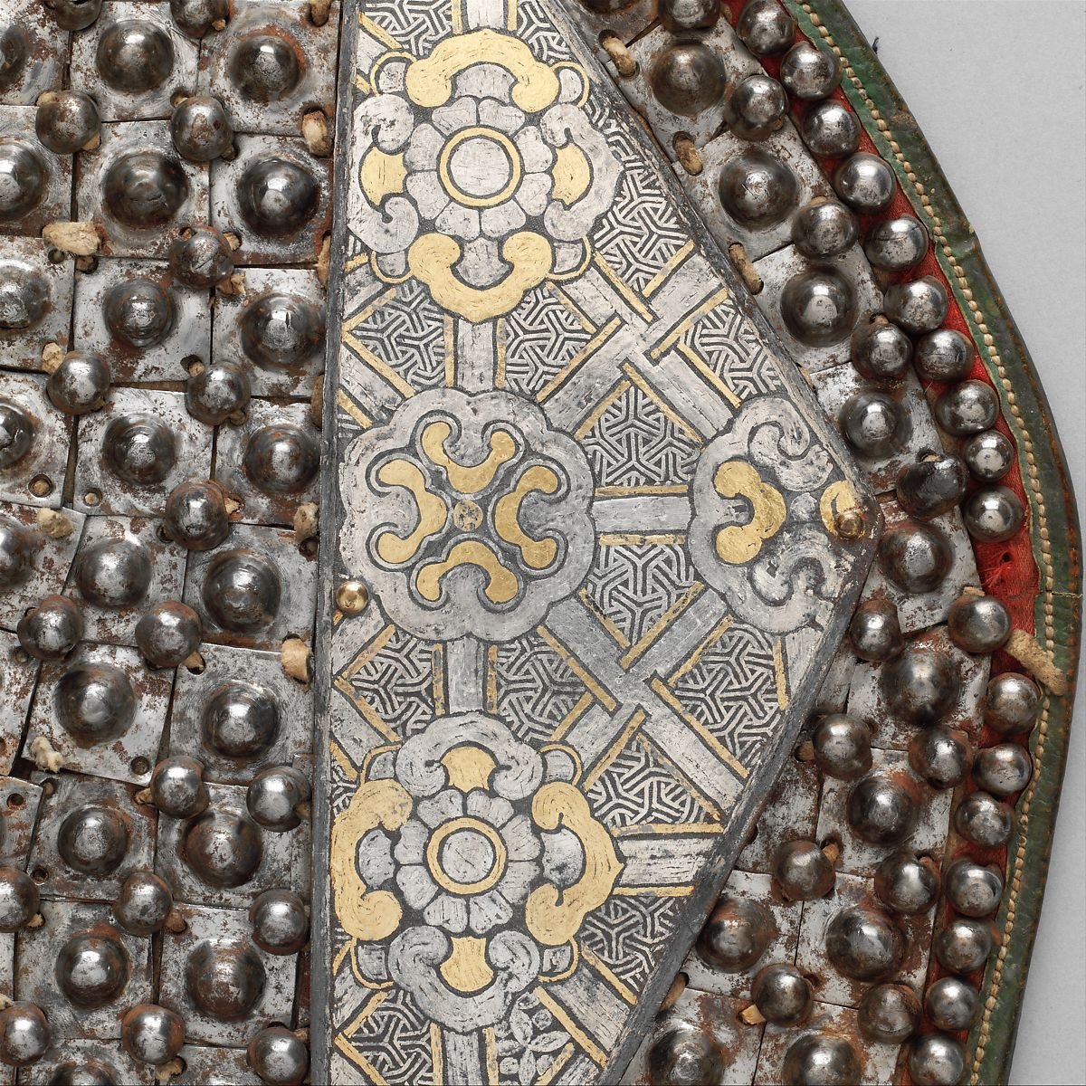 hOLD UP, I HAVE NOW ENCOUNTERED THIS PATTERN FOR THE *FIRST TIME EVER* ON AN ACTUAL HISTORICAL PIECE OF ARMOR it's on c. 16th century horse armor from Tibet or Mongolia, and it's very extremely small. This explains NOTHING