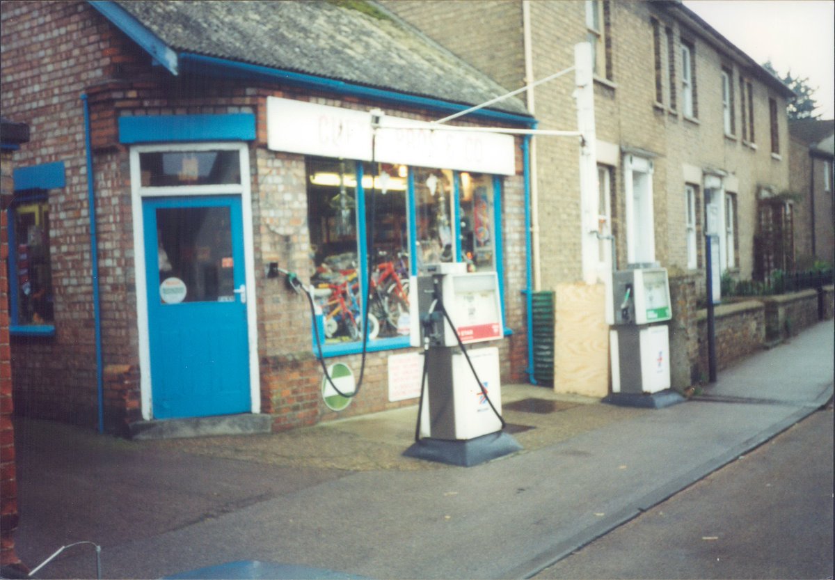 Day 115 of  #petrolstationsBulldogCurtis Bros & Co, Lakenheath, Suffolk, 2001  https://www.flickr.com/photos/danlockton/16069113918/  https://www.flickr.com/photos/danlockton/16230746416/  https://www.flickr.com/photos/danlockton/16230744916/An old village cycle shop & garage. Bulldog—based in Halstead, Essex—was taken over by Carless (and they, in turn, by Repsol)