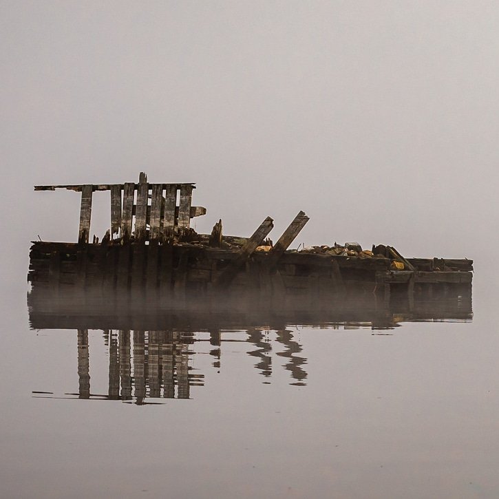 westernNLhouses's tweet photo. "Reflection of Degradation" #newfoundland #photography #canon #cornerbrook #boomdocks #forestry #history #waterway https://t.co/p3SUOc1WWq