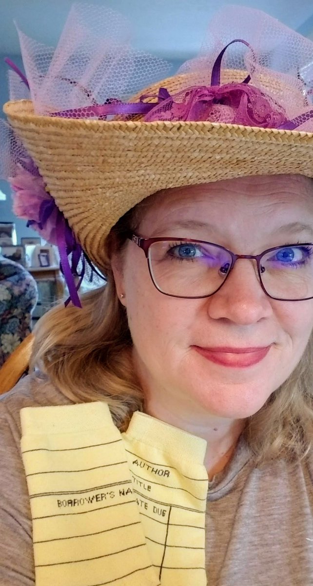 DHS virtual spirit week, day 4: Hats and crazy socks. My "Marian the Librarian" hat from the Music Man and my book check out socks. #DickinsonHighSpirit #BeMighty