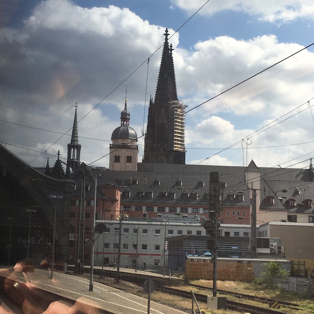 And, indeed, following a late lunch, we were happily drinking a wee beer in the buffet car as we pulled into Cologne, where you get a brief, impressive view of Cologne Cathedral. But photographing it isn't easy.