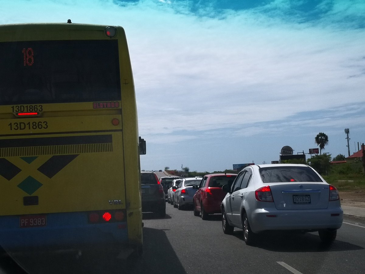 mikey_esquire's tweet photo. So I sat in the line to come out of Portmore a while ago because I am considered an essential worker. The vast majority of people in the line? Work dem a go too. When I said about 70% of Kingston workforce live in Portmore I wasn't joking. Just ask NCB and TAJ. https://t.co/zqutqiW2bV