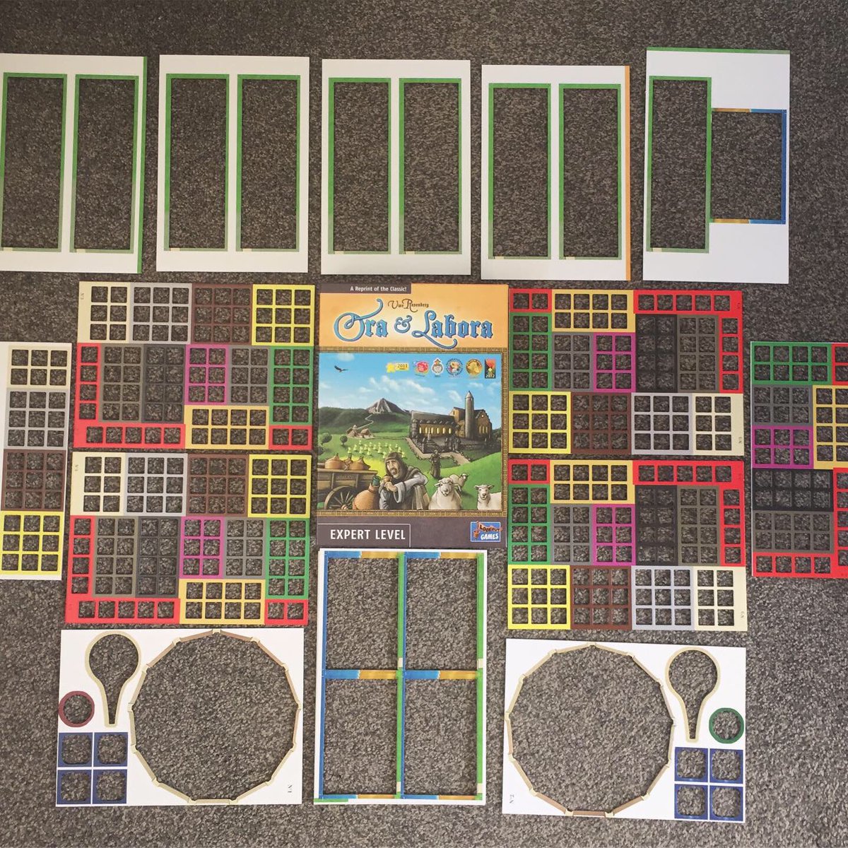 Took a while to punch out Ora et Labora (<a href="/LookoutSpiele/">Lookout Spiele</a>), but I got there in the end! I’m delighted all the (450) cardboard chits fit into one of my plastic ‘hobby boxes’. Should save lots of time for set-up/pack-down. Next task: read and digest the rule book! #boardgamegeek #bgg