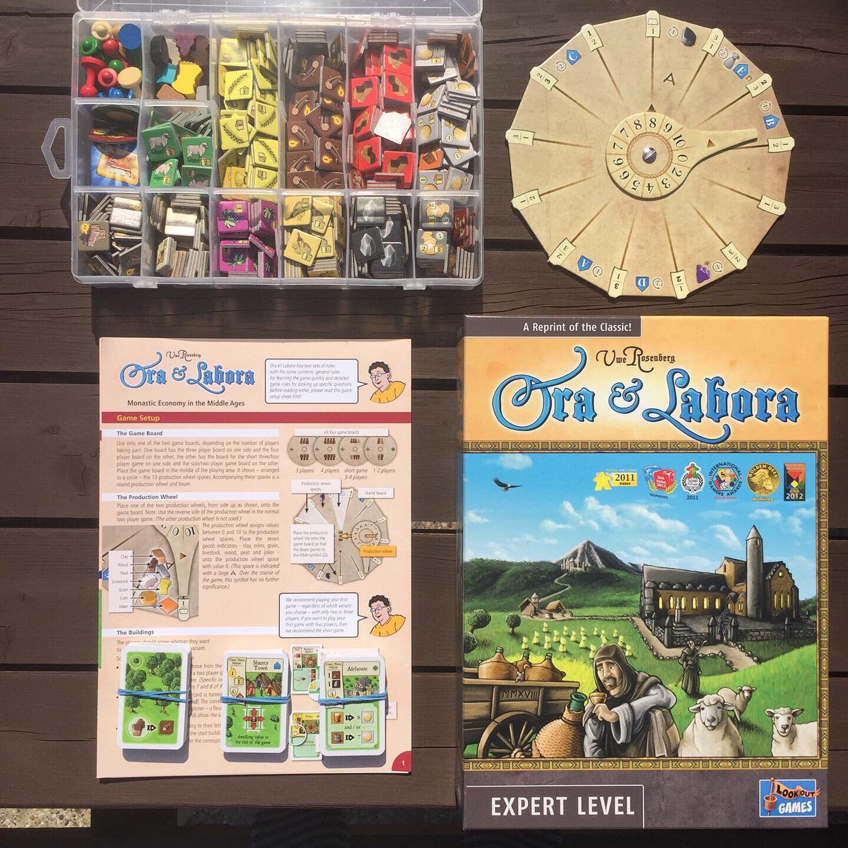 buryboardgames's tweet photo. Took a while to punch out Ora et Labora (@LookoutSpiele), but I got there in the end! I’m delighted all the (450) cardboard chits fit into one of my plastic ‘hobby boxes’. Should save lots of time for set-up/pack-down. Next task: read and digest the rule book! #boardgamegeek #bgg https://t.co/JjfLUUOfyI
