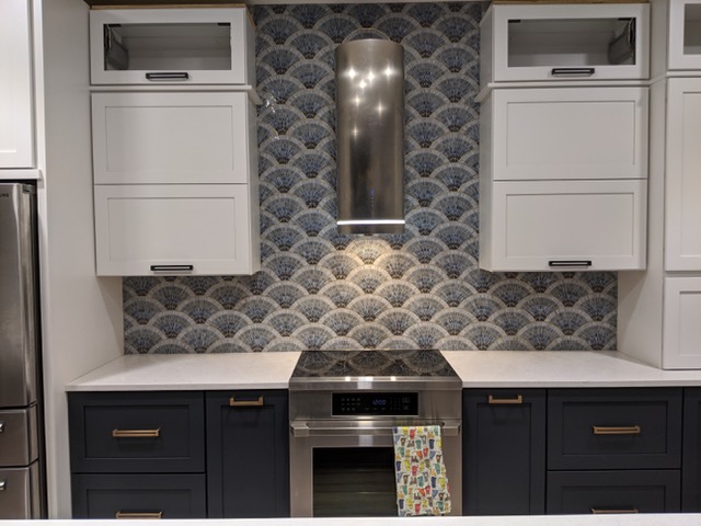 Let's do something different this week .... Each day a Pullman West team member will share a photo of a recent home project. Today's photo comes from Erica, our K&amp;B Designer. Her kitchen remodel is complete with the installation of this beautiful backsplash tile. Great job Erica!