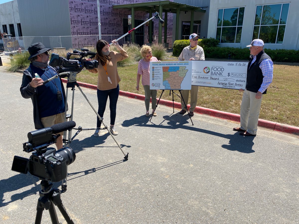 ArFB's tweet photo. ArFB President Rich Hillman and @ARFarmBureauIns EVP David Moore present a donation check to @arfoodbank at their headquarters in Little Rock. #AgGivesBank #AgAtWork #AFBIC #ArFB #KeepingFoodOnTables #ARFeedsTheWorld #COVID19 https://t.co/l1sXwgudS0