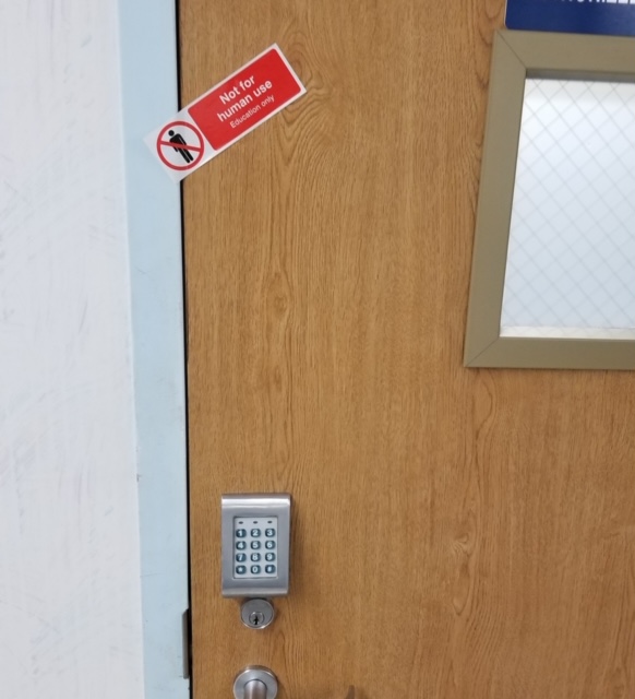 ToKeepSimSafe's tweet photo. This provides a warning to those who may be "shopping" for supplies, and acts as a seal to discourage people from opening the cabinet.  It is also an alert that if the seal was broken, supplies may have been taken, and to allow for inventory control. https://t.co/lcXP9I717t