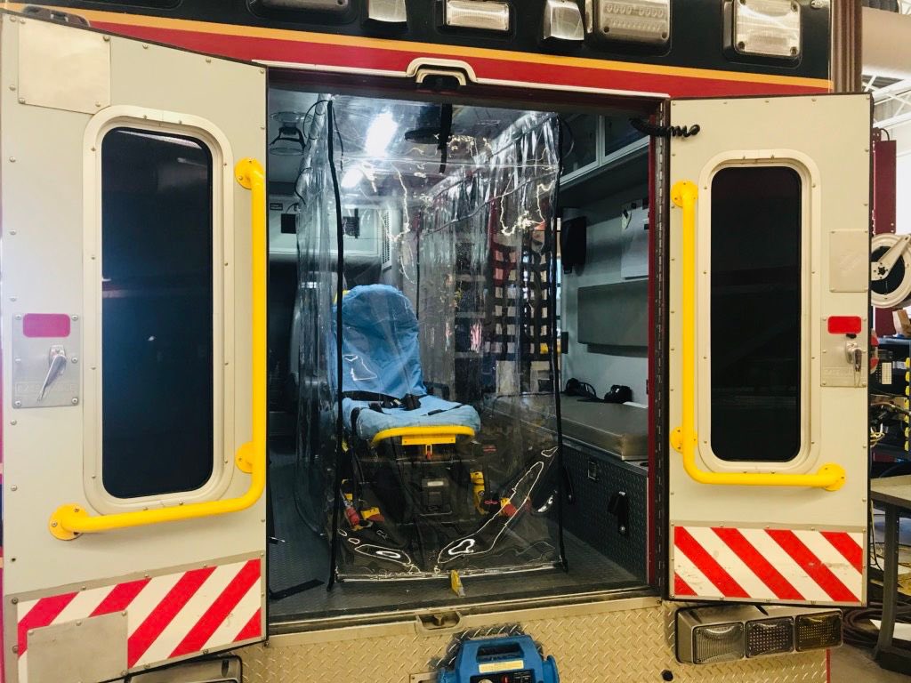 ShreveportMayor's tweet photo. The Shreveport Fire Department is taking steps to protect paramedics and firefighters when transporting potential COVID-19 patients. They have installed isolation tents made of heavy grade vinyl in the rear of SFD ambulances. (1) https://t.co/8EVp7dKi1t