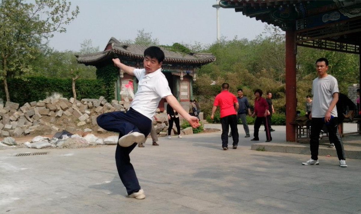 China pic, day 2:Shijiazhuang, Zhaotuo Park, 2013. This guy was the most elegant kicker of the 毽子 (Chinese hackey sack) that I ever had the honor of watching.