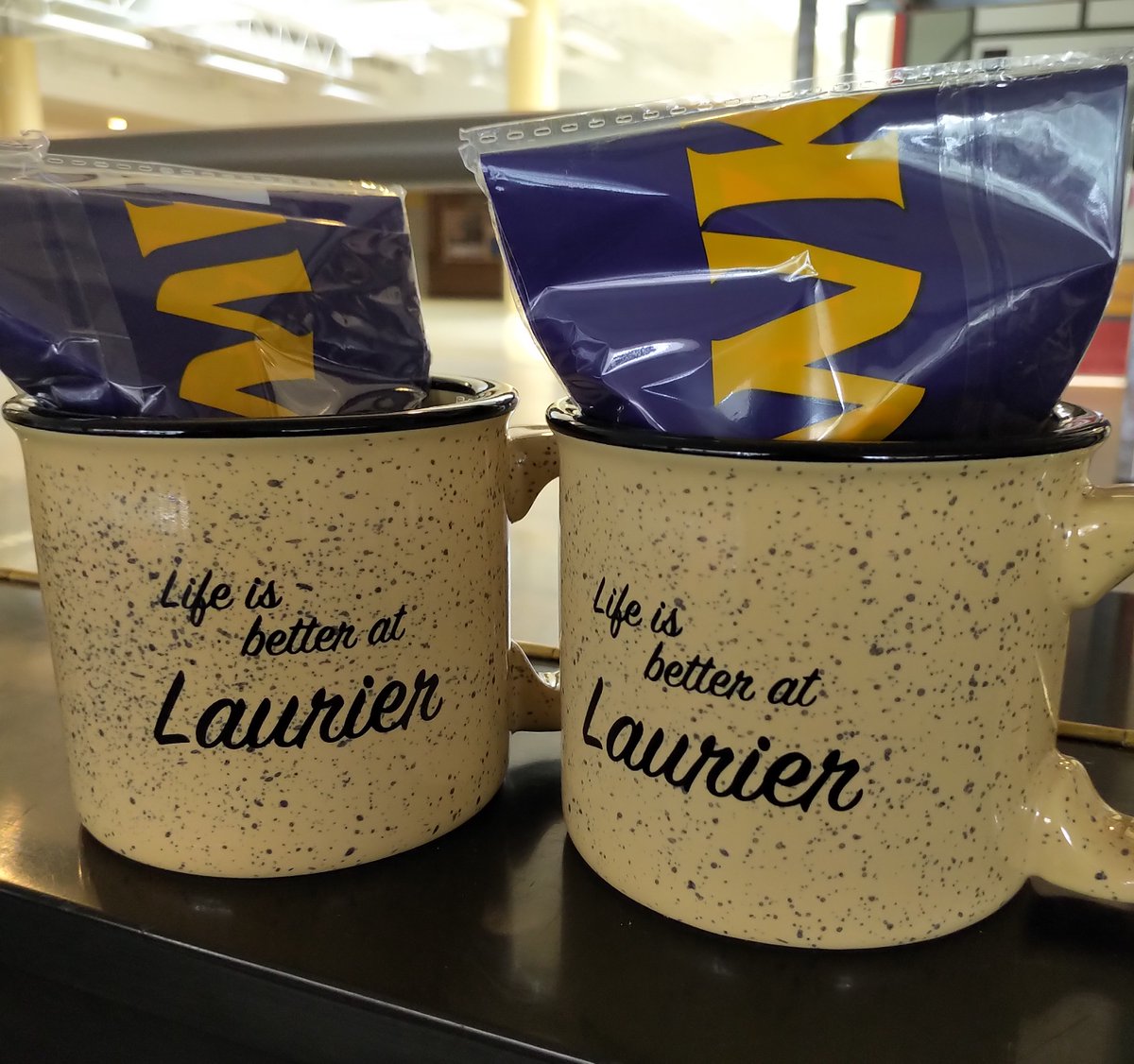 LaurierOneCard's tweet photo. Mugging for the camera...💜🧡

These two need homes
yours? RT = my crib
#2mugs2winners #uwinitwemailit
Bonne chance
(ps - "life is better WITH YOU HERE at Laurier") 
💜🧡 https://t.co/0qK4RJ2KzD