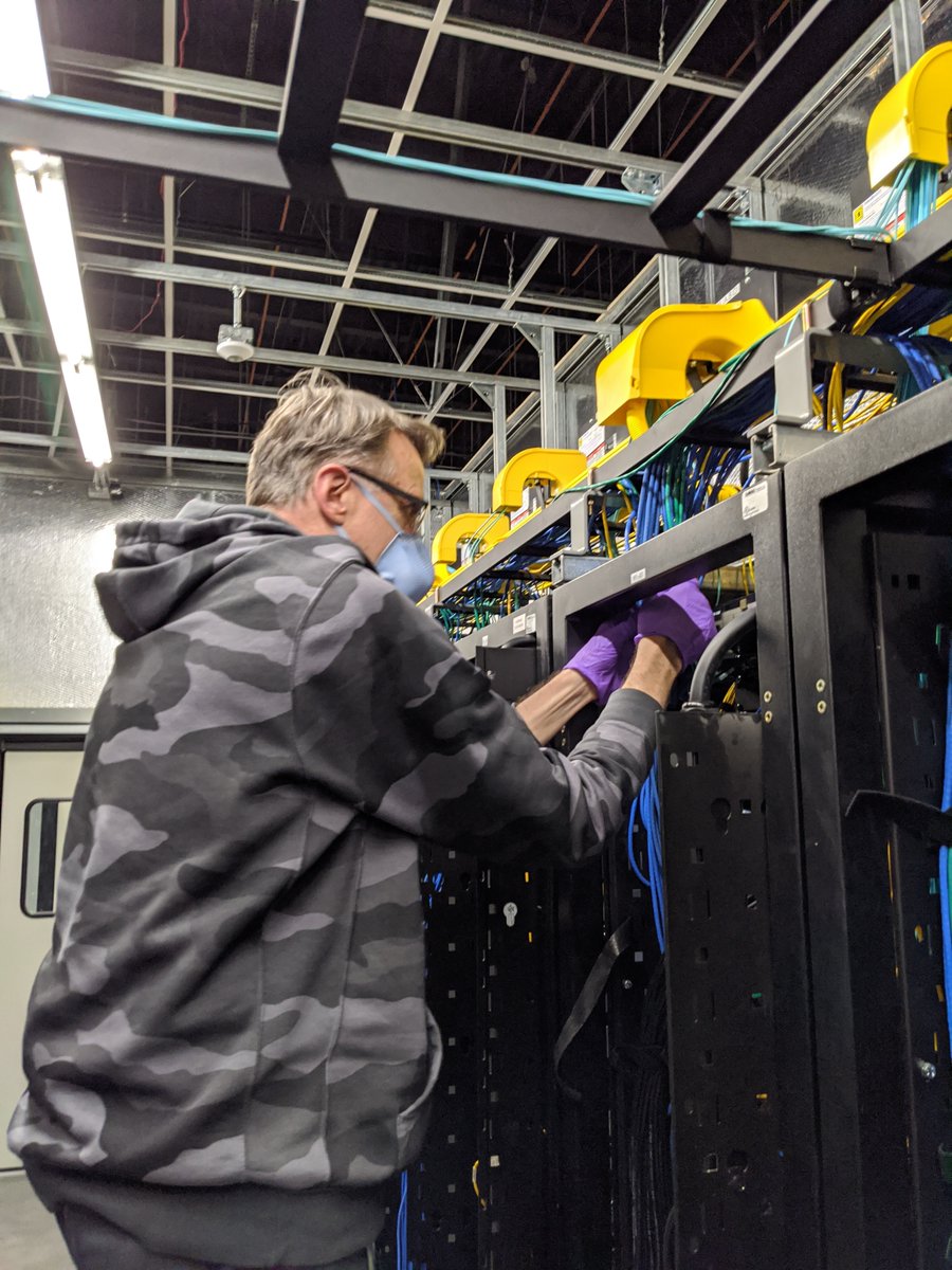 RajivRamaswami's tweet photo. Here are two of our #DCOps team members who are working in our Data Centers to keep things moving for our @VMware 30k+ employees globally, most of whom are working remotely during this pandemic. @baskiyer @VMware_IT #VMwareIT #IT https://t.co/yuzb5C0EbU https://t.co/KHGrvt5ssE