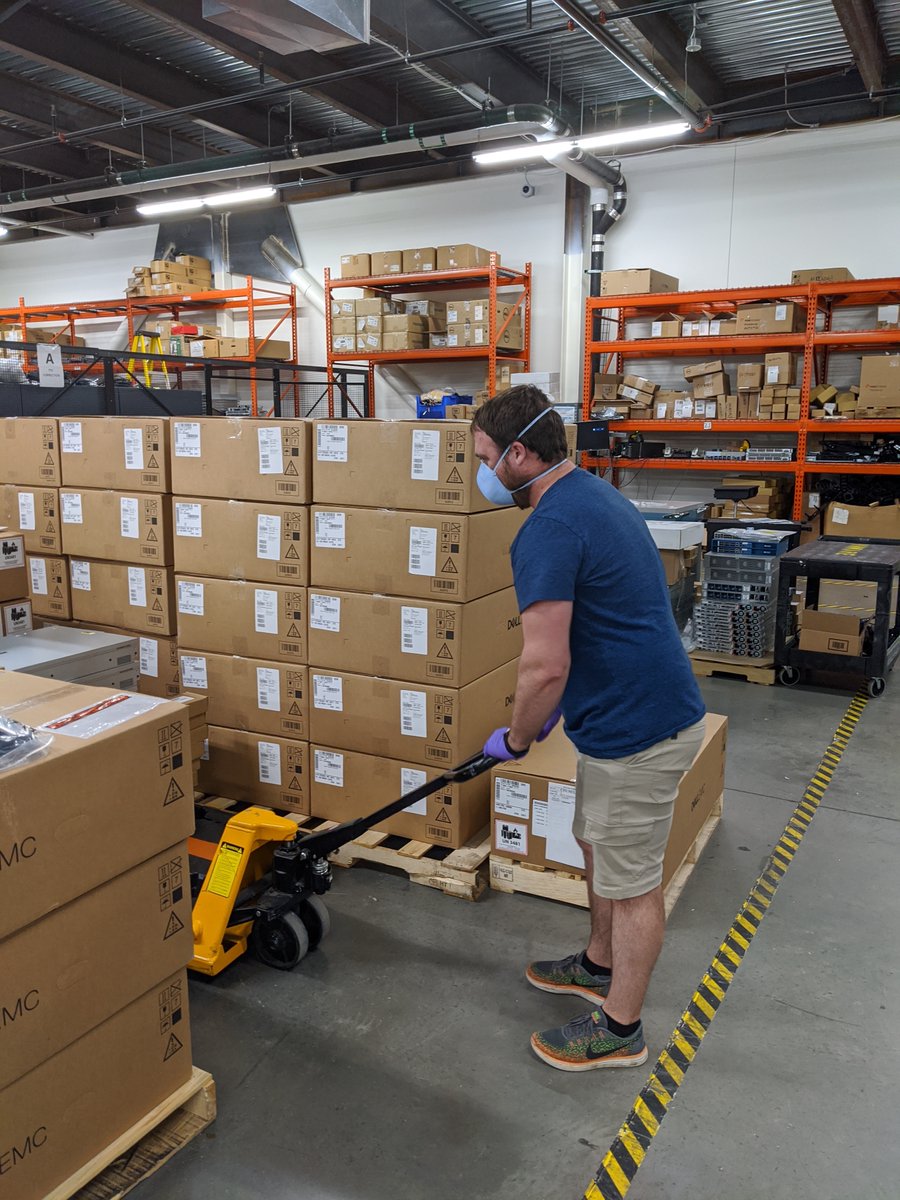 RajivRamaswami's tweet photo. Here are two of our #DCOps team members who are working in our Data Centers to keep things moving for our @VMware 30k+ employees globally, most of whom are working remotely during this pandemic. @baskiyer @VMware_IT #VMwareIT #IT https://t.co/yuzb5C0EbU https://t.co/KHGrvt5ssE
