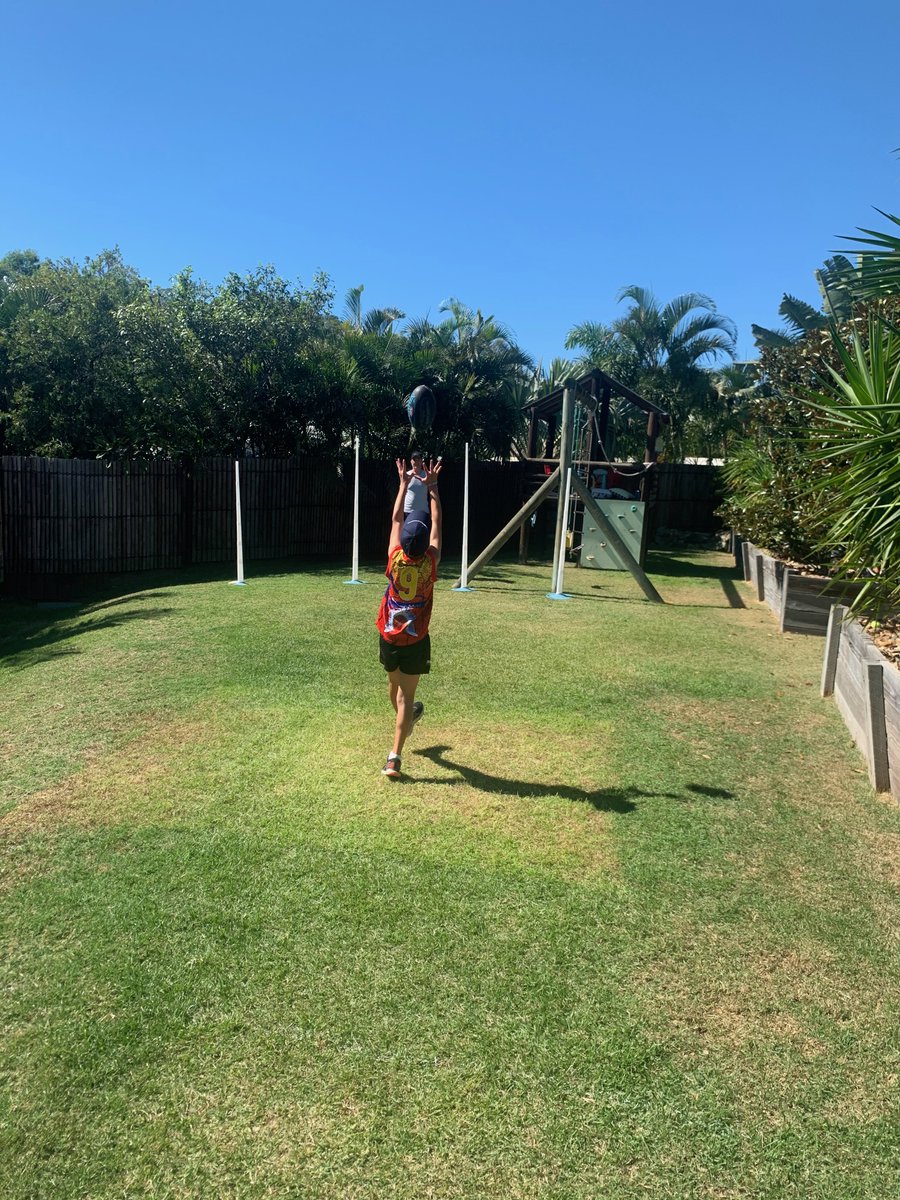 Isolation kicking goals with Dad, 📸 credit: Mum. Well done team 😍😍 #fun #juniorfooty #kids #sport #footy #posthigh #sports posthigh.com