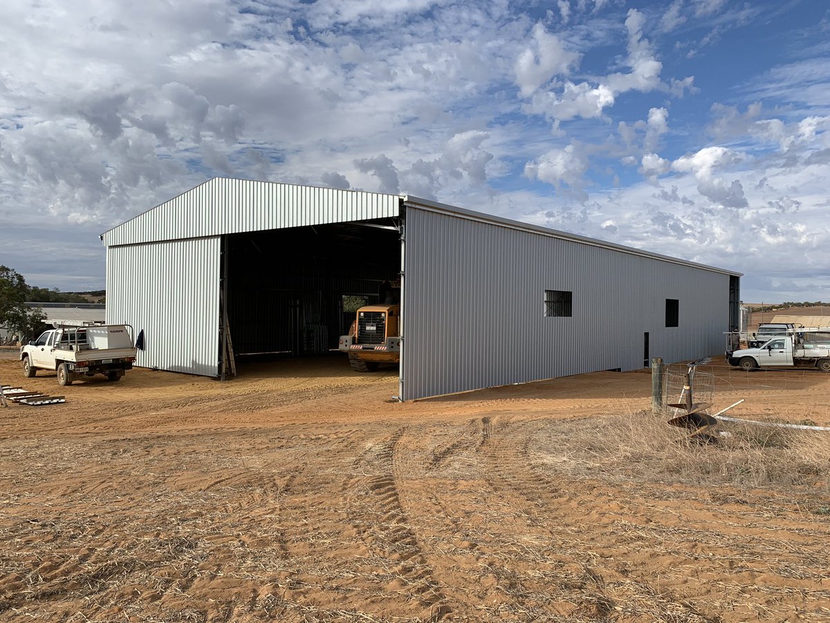 CarimorSheds's tweet photo. Progress on our latest shearing shed is coming along nicely with a lot achieved over the last week. Shed is now fully sheeted, internals marked out with holes dug and most stumps cemented in.
#construction #steelfabrication #sheds #shearingsheds #geraldton #midwest #shedbuilder https://t.co/uaDbWJT7iG