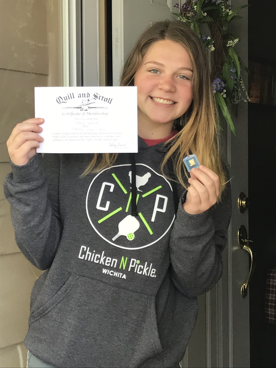 RailerNews's tweet photo. Junior Shelby Spreier poses outside her door with her certificate and pin.

Spreier is a 2nd year staff member and was inducted this year. https://t.co/fcZS5jhqFj