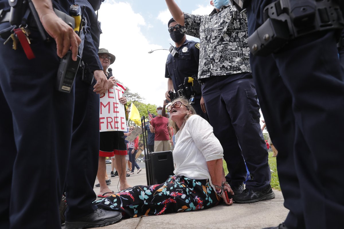 StarAdvertiser's tweet photo. Arrests made at reopen Hawaii rally in front of State Capitol https://t.co/tbOArTOuCK https://t.co/AuHYOrzPhw