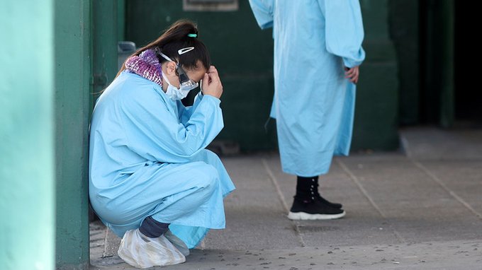 AJEnglish's tweet photo. For weeks, Argentines cheered on healthcare workers on the #coronavirus frontlines. 

But now, an uglier behaviour has also taken root - with workers harassed and threatened as stigma grows https://t.co/BsTSGHK0hY https://t.co/09PDHL0xkS