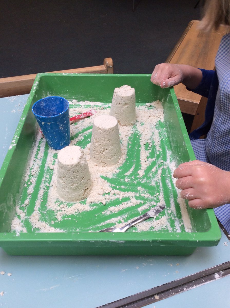 Sand is always fun to play with. We made our own today from flour and oil. It was great for making sand castles, volcanoes and milkshakes for the Queen.