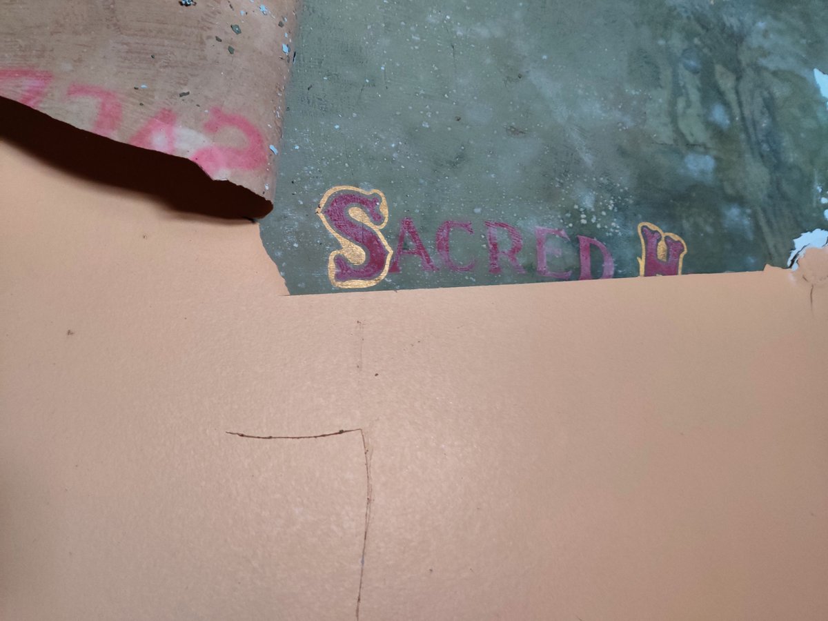 The Sean MacDermott Street laundry. At the end of the central corridor is the stair leading up to the convent. As the walls are deteriorating they expose the underlying layers, revealing a lot of the history of the place.