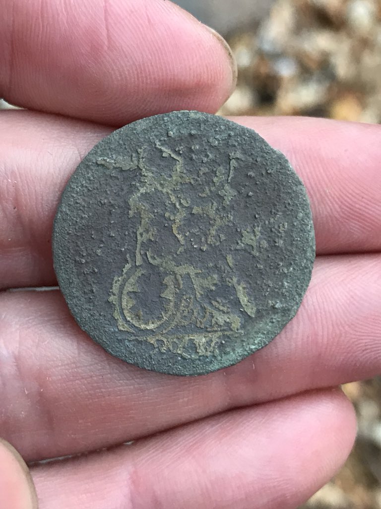 ..then I discovered a big penny from the reign of King George III. There were other Georgian coppers too & more buttons as well as little pieces of lead. The sun was shining, the field was beautiful & I was having the time of my life. Then I got another signal. A large signal..