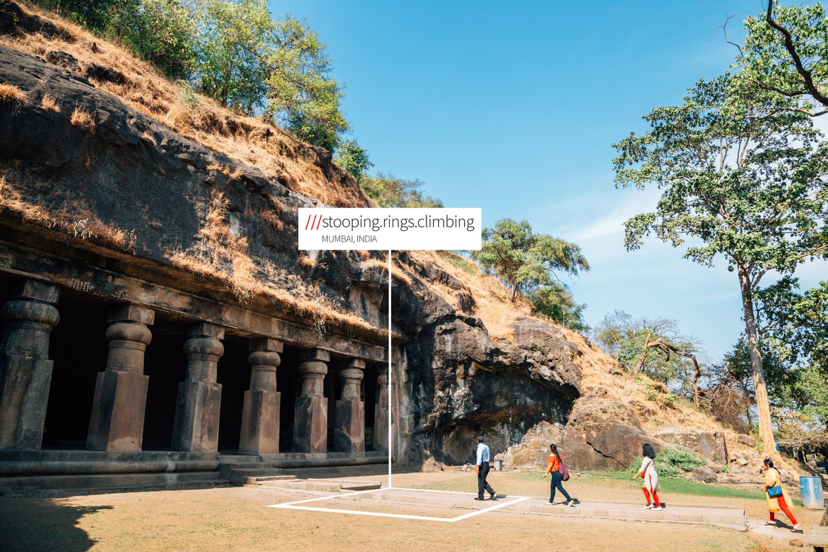 People approaching caves at ///stooping.rings.climbing in Mumbai, India