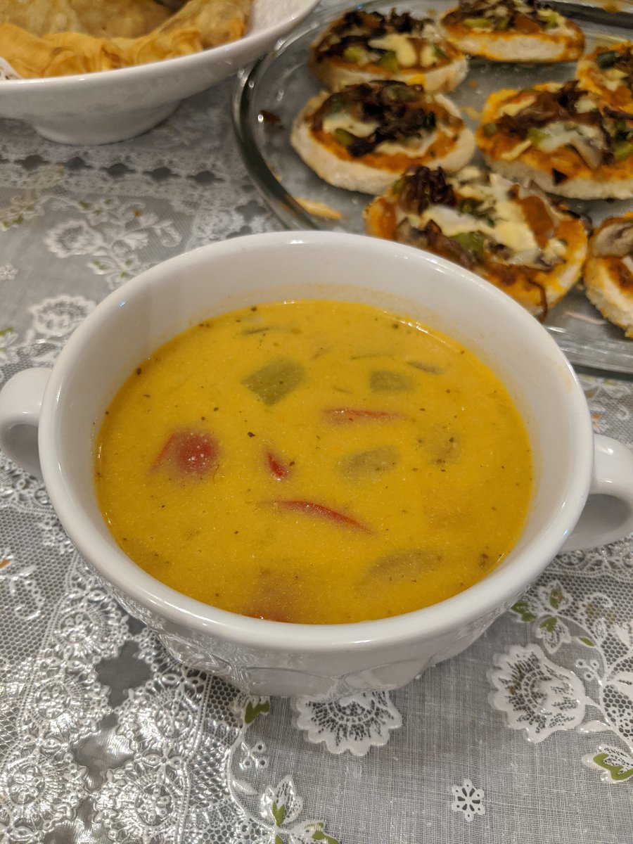 Using leftover Tomato Bisque and Cream of Cauliflower Soup, I made Vegetable Leftover Soup.