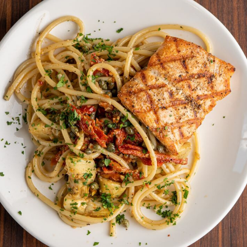stranghall's tweet photo. The wait is over — online ordering is NOW live! Place your order &amp; schedule a pick-up at your convenience via https://t.co/YYmDjZcC6v. @norcinikc &amp; @anousonekc have crafted menus with familiar favorites as well as new offerings. #StrangHall https://t.co/U4NCcoqtZr