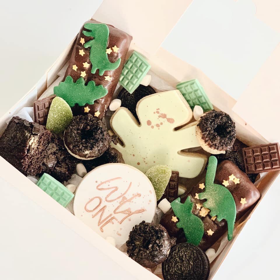What a fun lock down #vegan treat box from <a href="/ClemieVeganCake/">ClemieVeganCake</a> 💚 Made all the better because she uses our chocolate! 🦖🍫🦕😄

You can order it directly from her online shop! We must do everything we can to support small businesses in times like these! 

plamilfoods.co.uk
