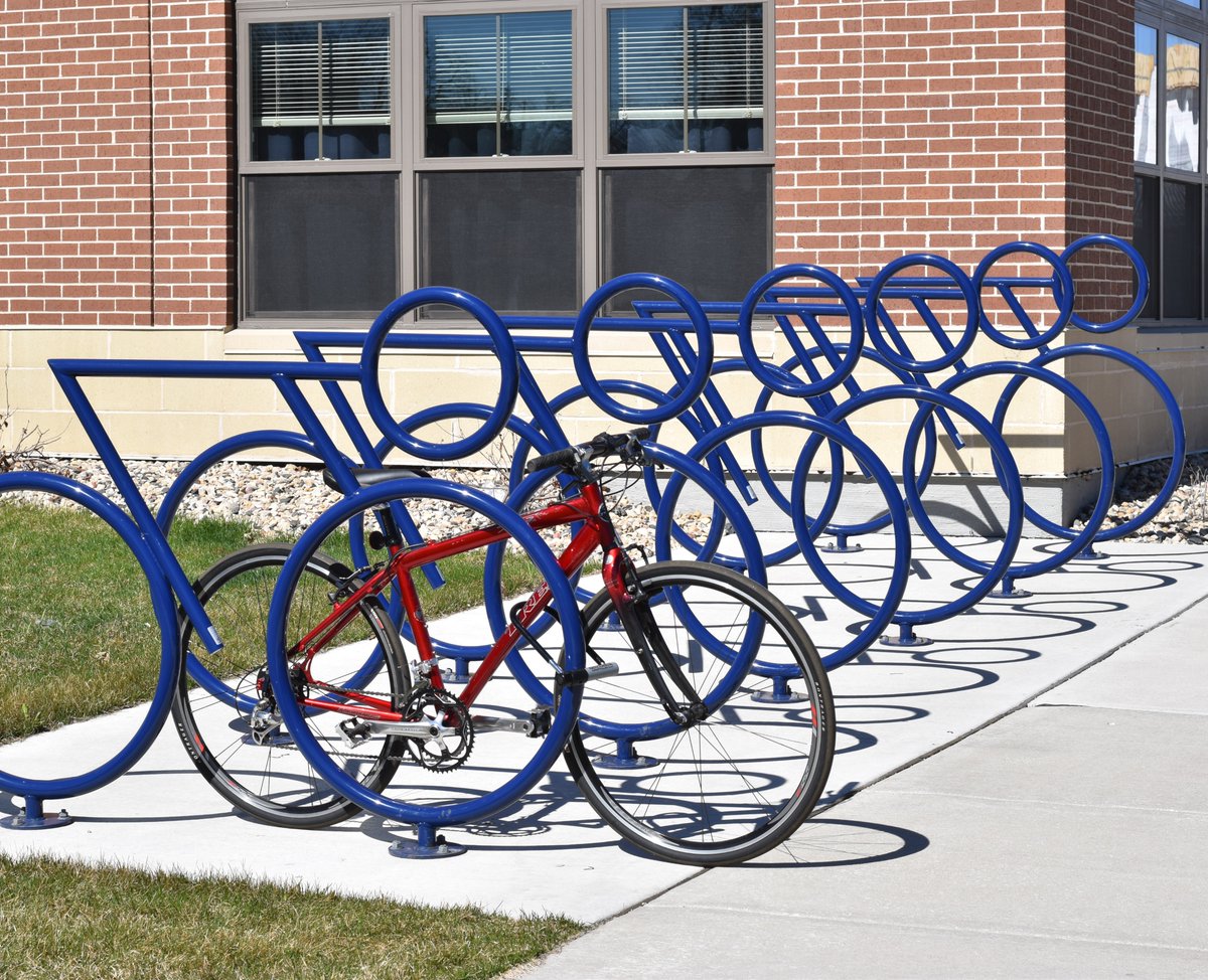 madraxbikeracks's tweet photo. We are Cyc'd 😉 to be back in bike-riding weather, even if it does rain a lot in Spring! There is no better fit for a city that loves its bike trails as much as Madison, WI! #installthursday #madraxbikeracks #bikeracks #architecturalproducts #mixedusedevelopment #creativebikerack https://t.co/T9ZOelg68Z