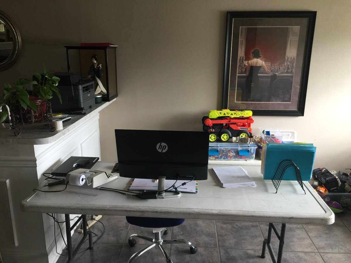 I2RCorp's tweet photo. Janice, our juggler of all things administrative, is a hard core New Orleans @Saints fan. See if you can spot the fleur-de-lis in this picture of her very organized #homeoffice. #workfromhome #coronavirus #neworleans https://t.co/tmIqdXMZFd