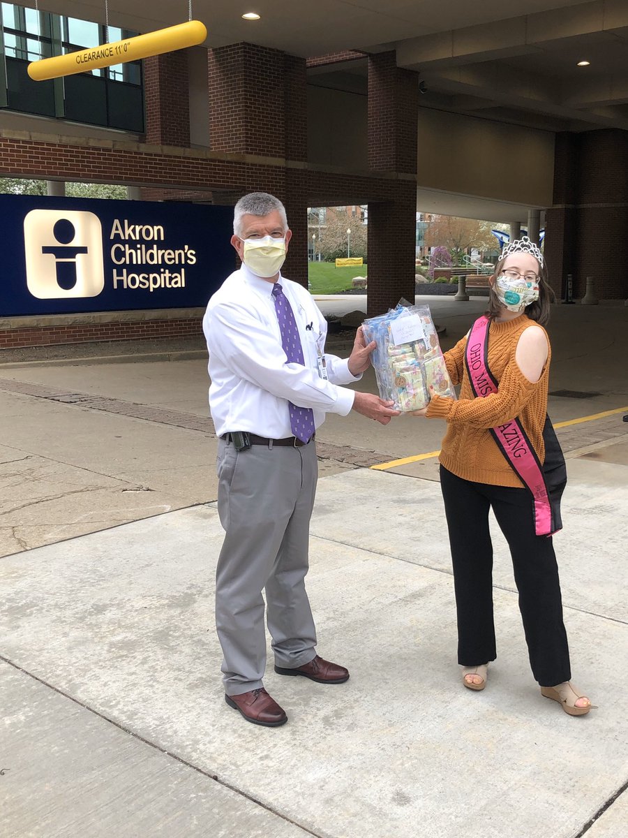 ACHShowersCtr's tweet image. Childhood Cancer Survivor and Ohio Miss Amazing 2019, Olivia Depiore, presents a donation of masks to @JeffreyHord for families to use @AkronChildrens where she received care and treatment.