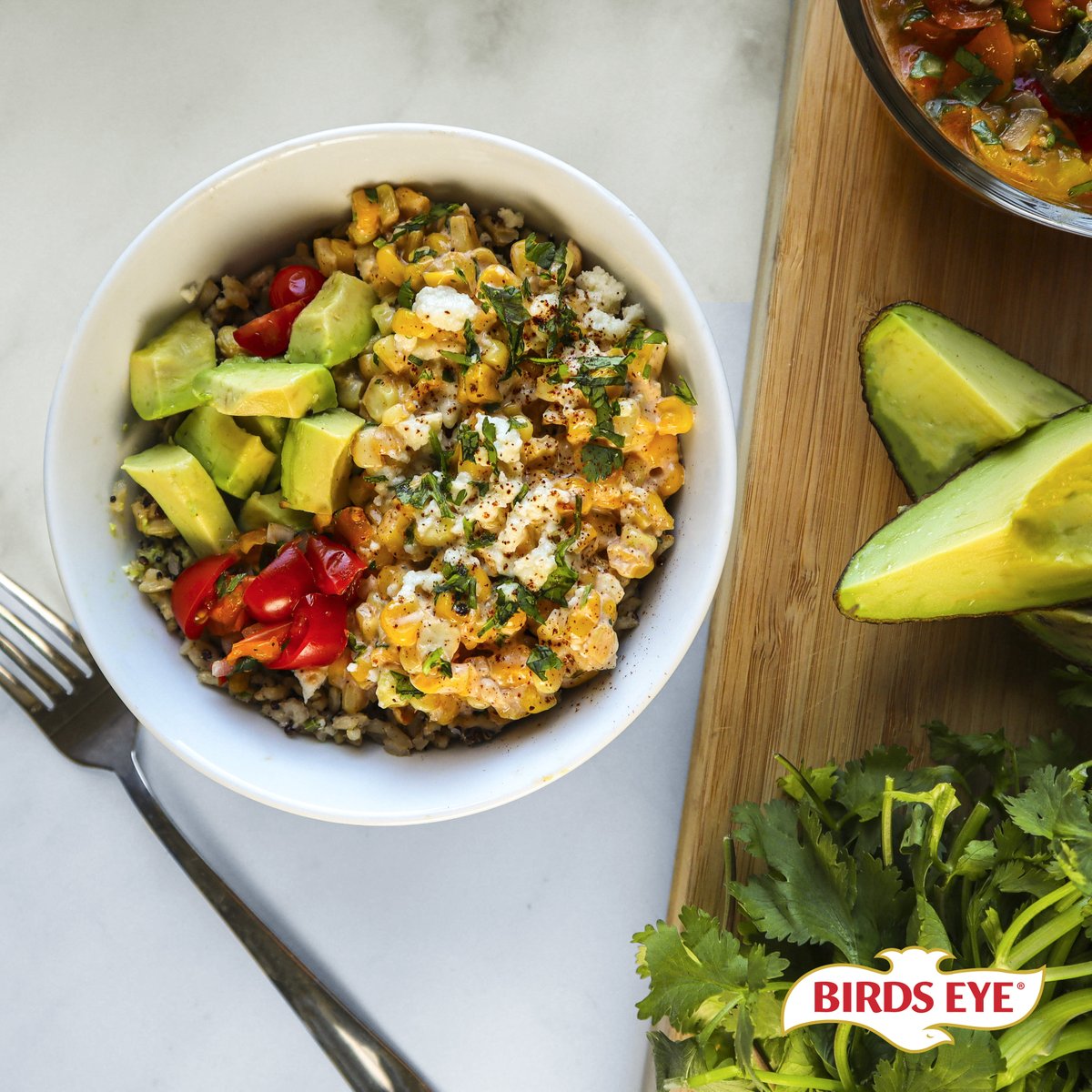 Every summer we enjoy plenty of grilled sweet corn, but this Mexican Elote Bowl is above and beyond using our Baby White and Gold Corn, salty queso fresco cheese, and spicy chili powder!