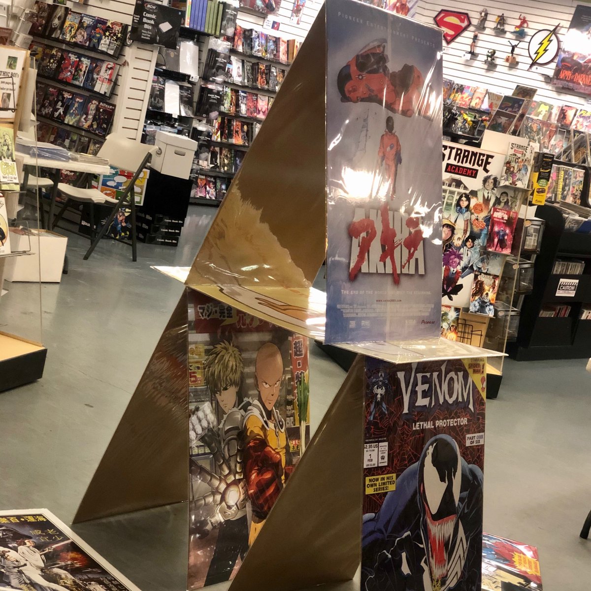 SamuraiComics's tweet photo. Day 30 of no customers. Started to build a giant house of cards with posters.... #samuraicomics #quarantine #postersfordays https://t.co/jrdk8Pj7xn