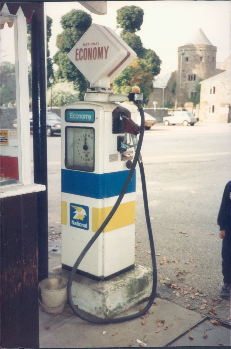 After Shell-Mex and BP split in the 1970s, National became a secondary brand for BP. The type was updated and the corners of the logo rounded (see this 1950s Beckmeter pump in Tiverton, Devon, photographed about 1990 but still with a 1950s glass National globe).