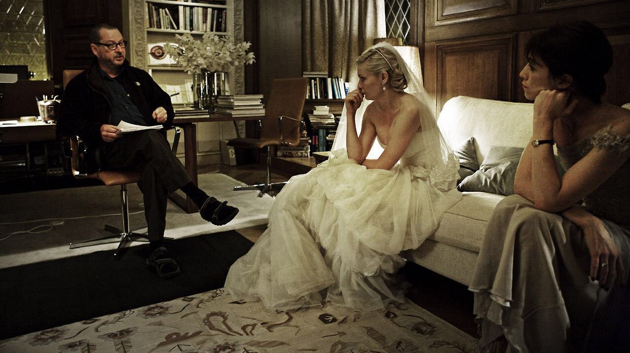 Lars Von Trier and Kirsten Dunst on the set of Melancholia (2011)

happy birthday to these two legends 