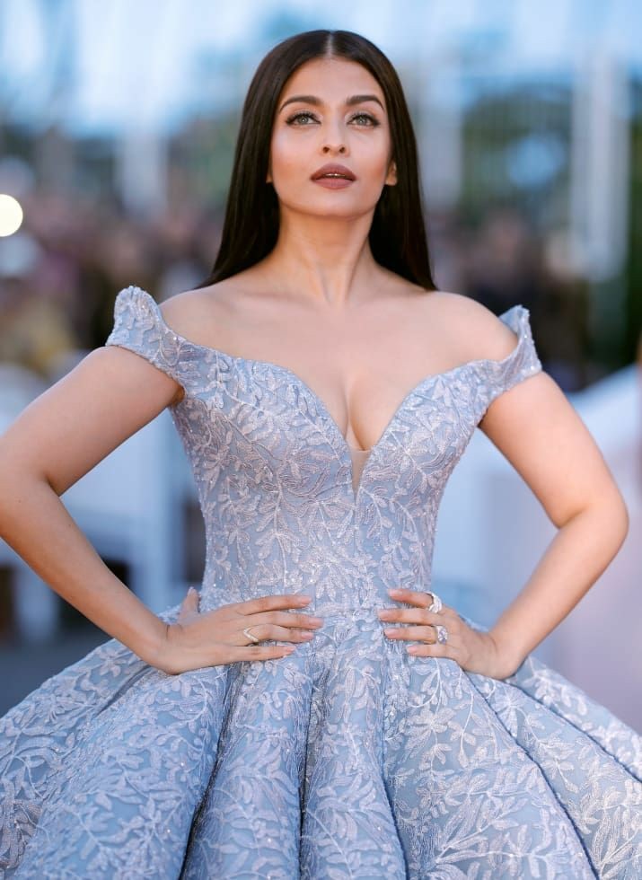 At the 70th Cannes Film Festival, Aishwarya Rai Bachchan wore a  floor-sweeping embroidered powder blue gown made by Michael Cinco which got  a 10-minute applause. A modern day Cinderella.