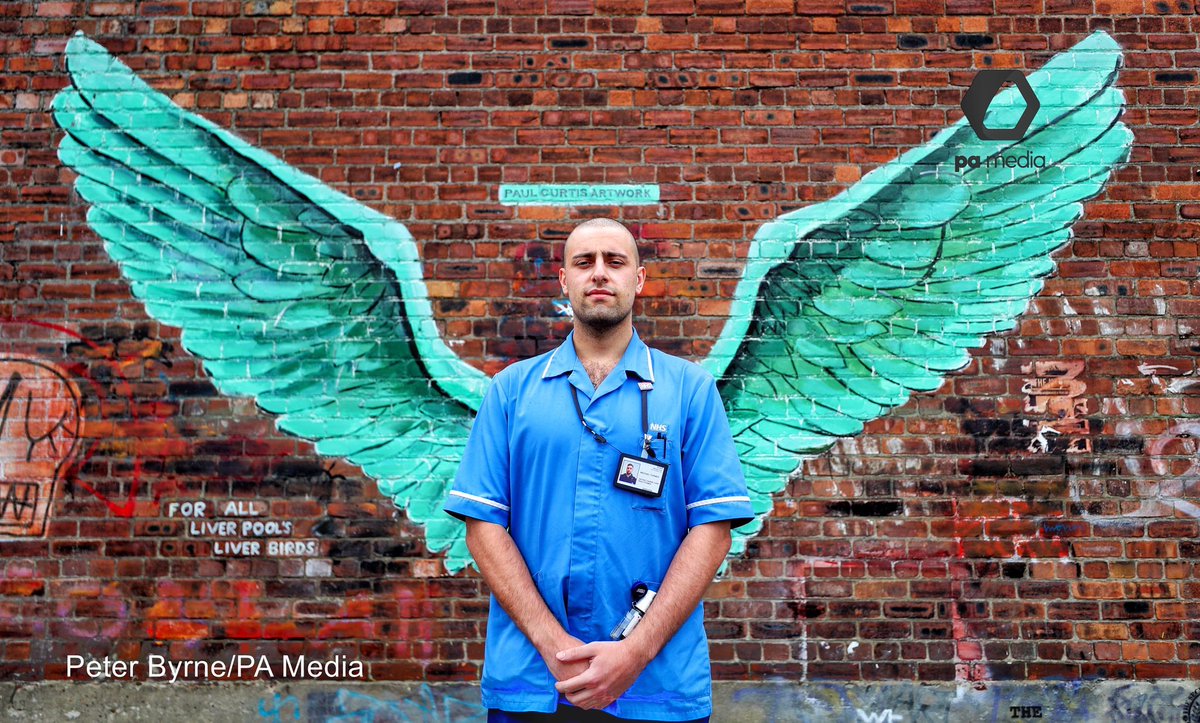 GraffitiPool's tweet image. Amazing images from @Peter_J_Byrne of NHS workers in from of @paulcurtisart ‘Liver Bird Wings’ #NHSHeroes