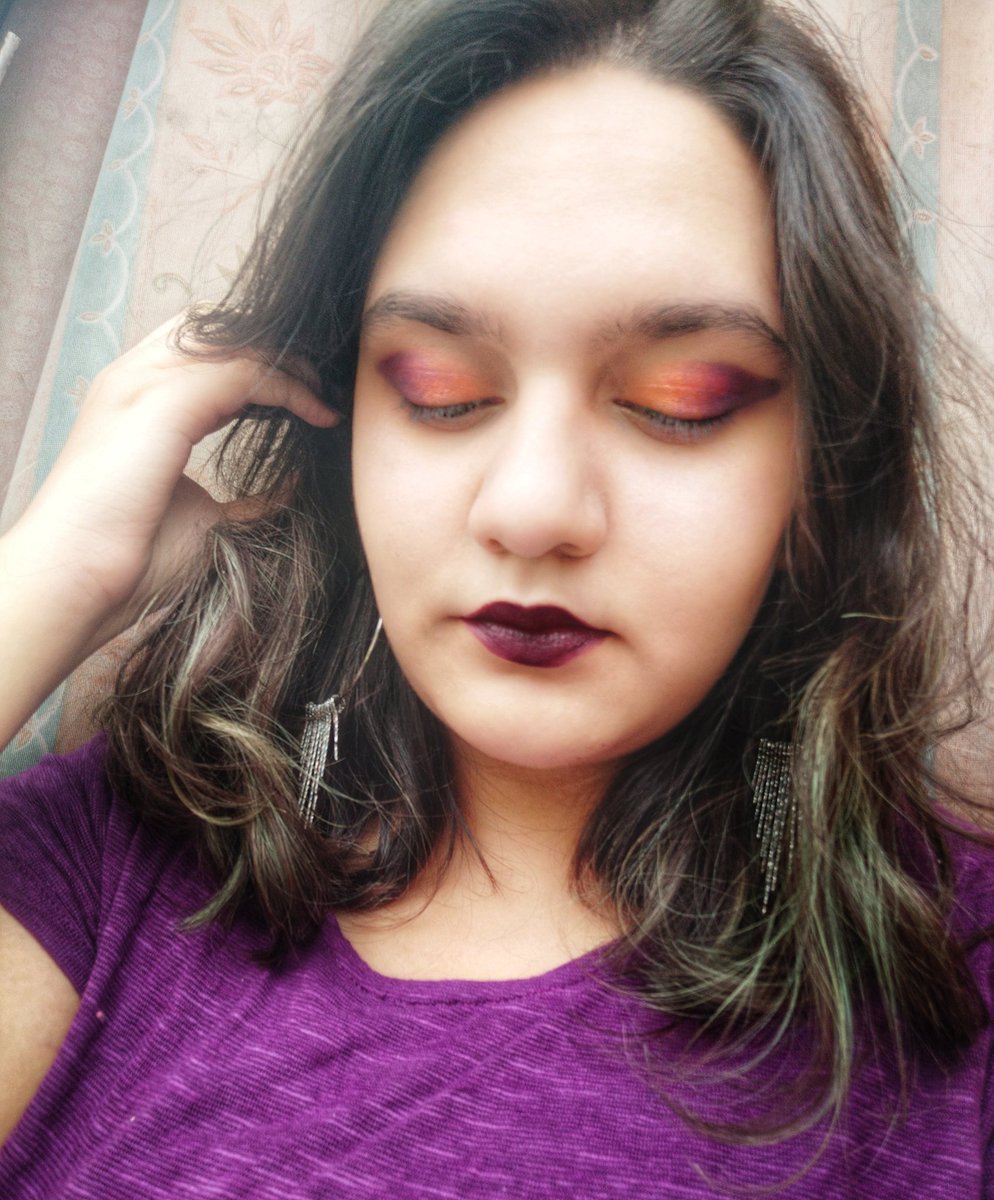  Day 1 I recreated the cover of The Weight Of Our Sky by Hanna Alkaf in shades of purple and orange makeup.
