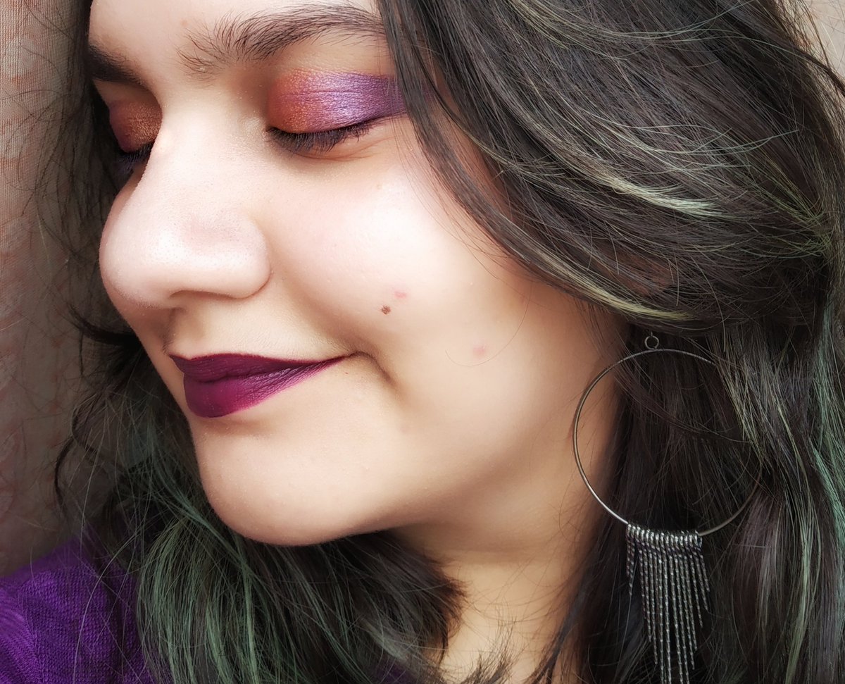  Day 1 I recreated the cover of The Weight Of Our Sky by Hanna Alkaf in shades of purple and orange makeup.