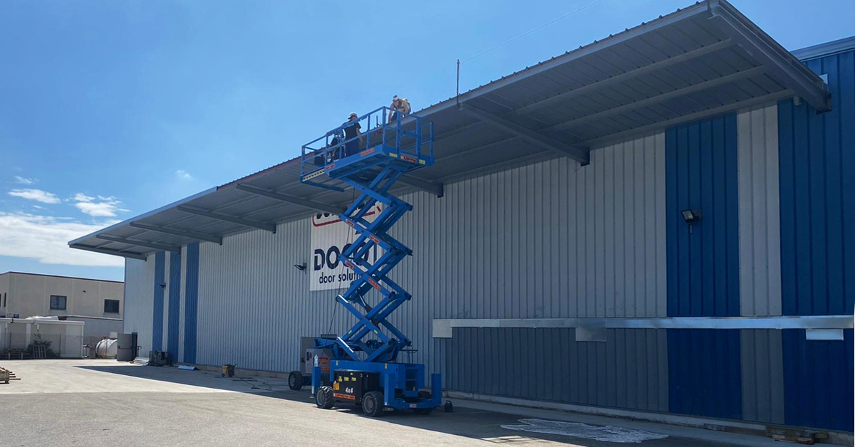 DocoInt's tweet image. At our Spanish subsidiary a new canopy has been placed to create more space in our warehouse for assembling track sets. DOCO: continuous improvement!