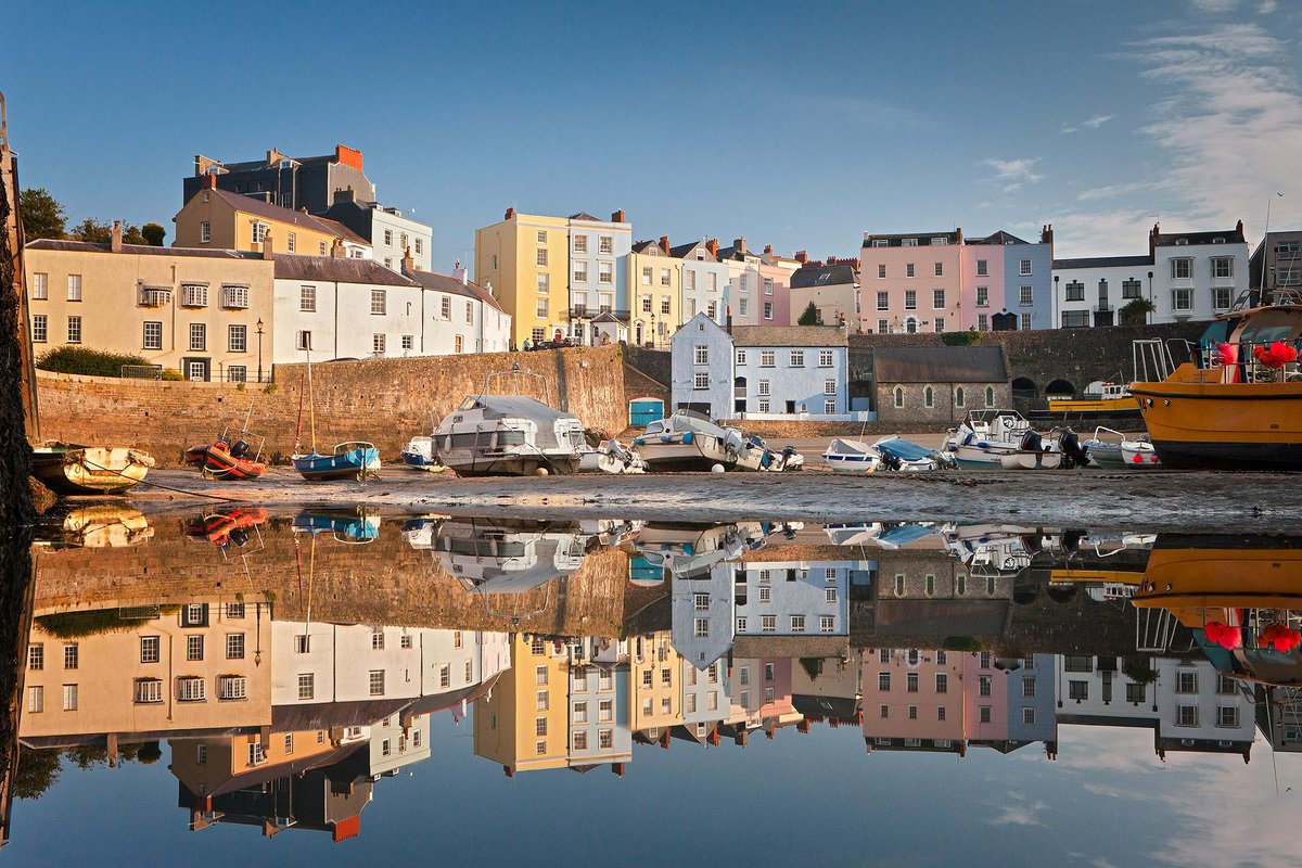 RoamWales's tweet photo. Now's the time for daydreaming and coming up with future travel plans!  Today we look south west to this beautiful view and reflection of Tenby harbour #visitwaleslater https://t.co/mtZjRPRU0f