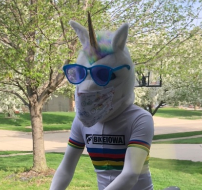 JessRundlett's tweet photo. You like interesting things @rogerriley and I can’t think of anything much more interesting than a unicorn bicycling around #DesMoinesIA delivering #MayBaskets on #MayDay - all while wearing a #COVID19 mask! https://t.co/mOKu1UuuNO