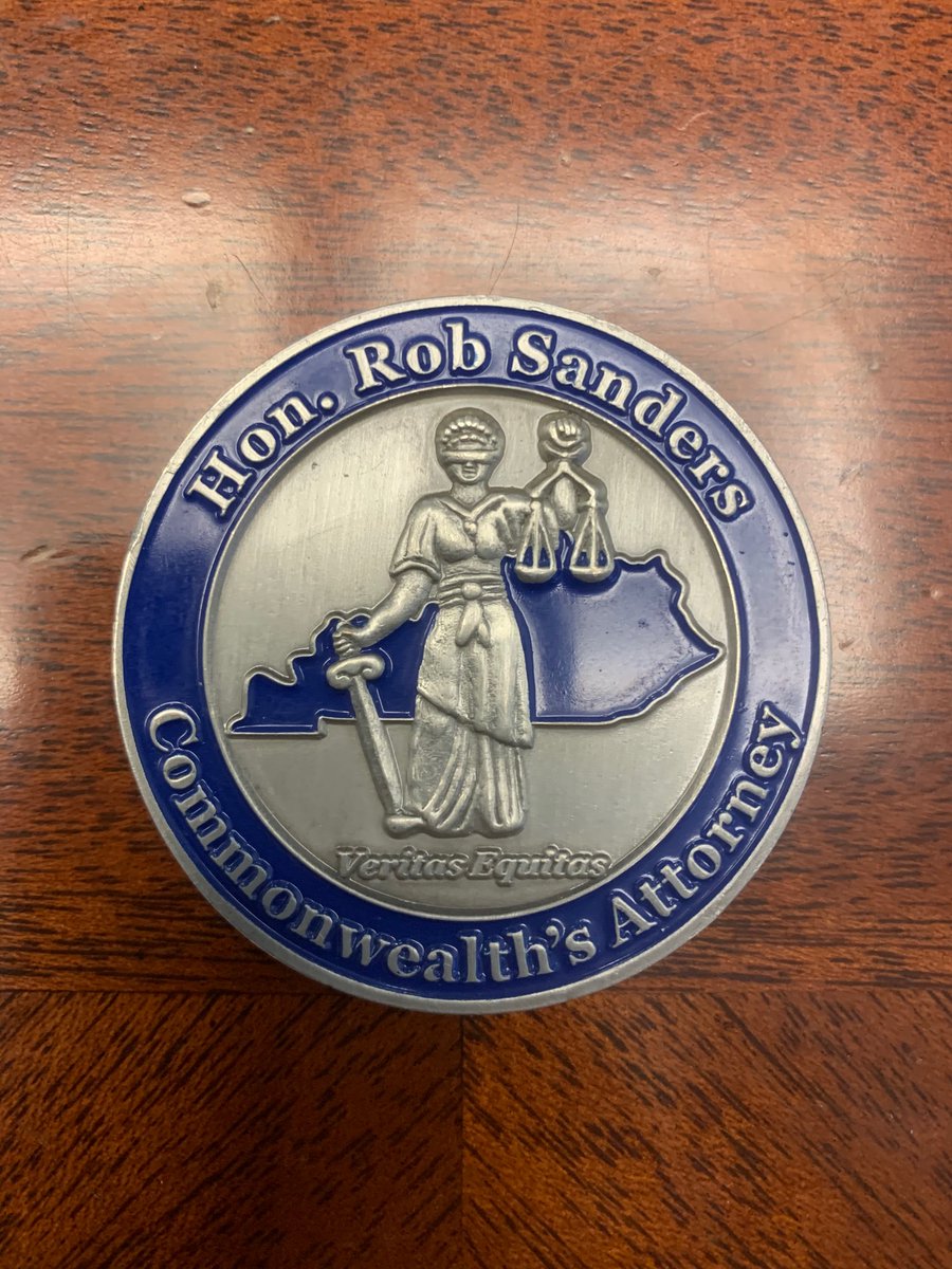 WDKYnews's tweet photo. Albeit from “the other“ KY district of @USAttyDuncan, our #ChallengeCoinFriday today honors a well-regarded leader amongst our Commonwealth’s Attorney colleagues. They carry the bulk of the workload of serving victims and ensuing the rule of law in KY. @KYprosecutor @USAO_EDKY https://t.co/ncZsALVI5X