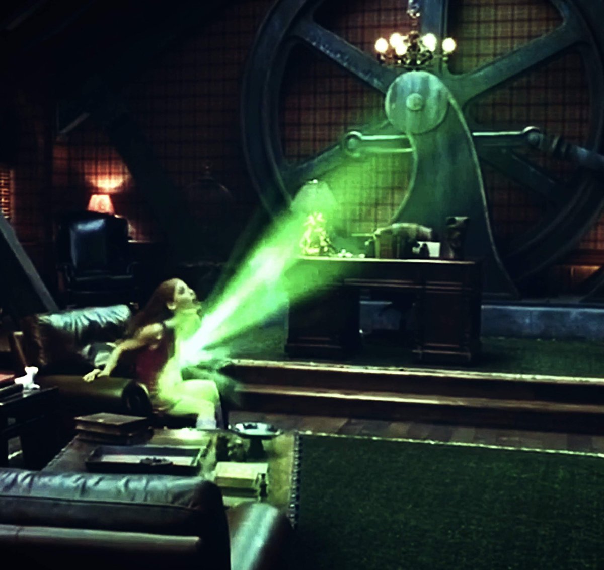 DaemonSpook's tweet photo. A fiery green haze from between a woman’s breasts https://t.co/23qwhCfJ67